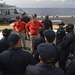 USS Makin Island Weapons Department Sailors receive uniform inspection