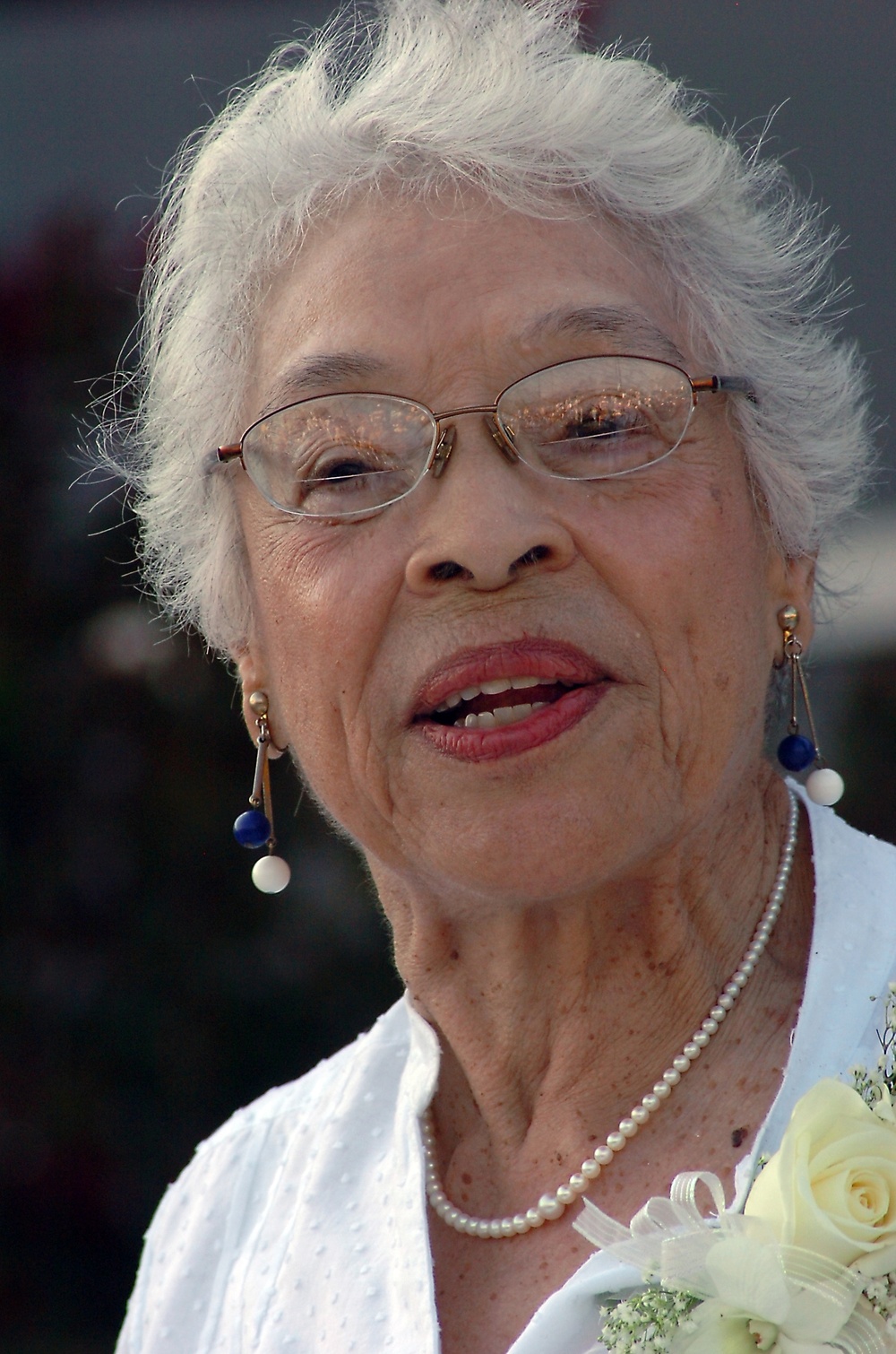 Alma Gravely, wife of Vice Adm. Samuel L. Gravely Jr., the Navy's first African-American Admiral, speaks during a ribbon cutting ceremony