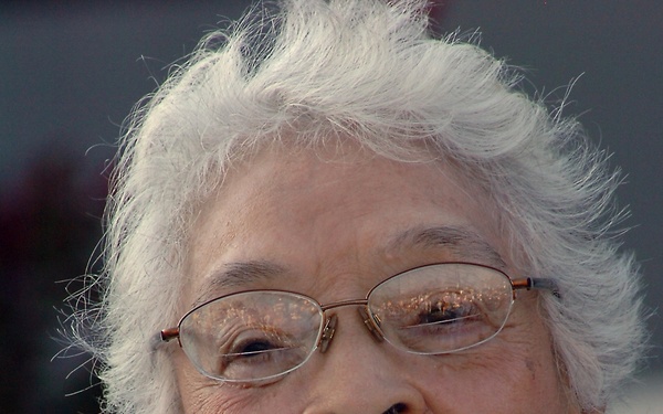 Alma Gravely, wife of Vice Adm. Samuel L. Gravely Jr., the Navy's first African-American Admiral, speaks during a ribbon cutting ceremony