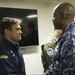 Brazilian naval officers and marines aboard USS America