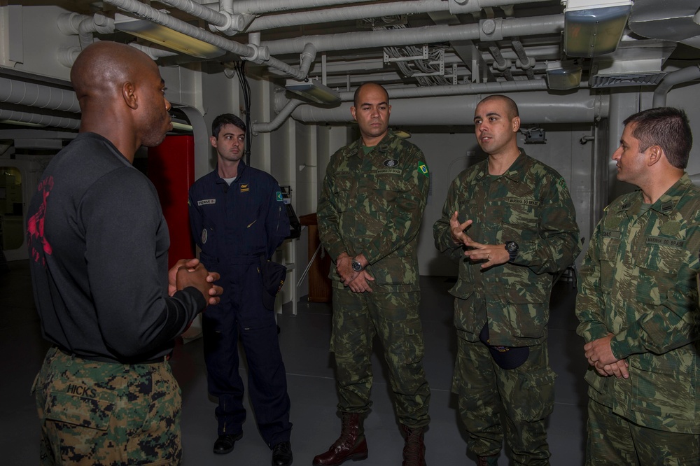 Brazilian naval officers and marines aboard USS America