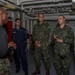 Brazilian naval officers and marines aboard USS America