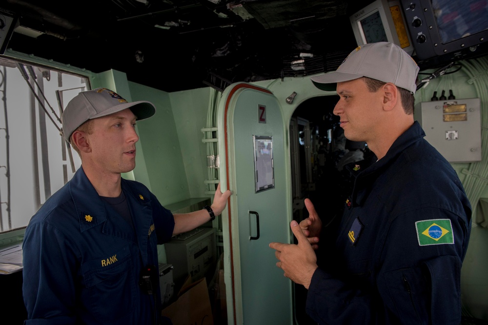 Brazilian naval officers and marines aboard USS America