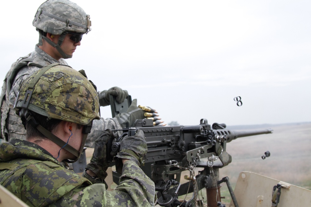 NATO paratroopers gain confidence on machine guns