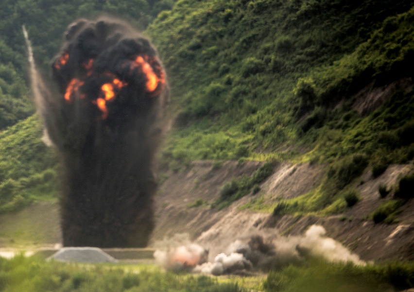 Exploding onto field, engineer Marines take range