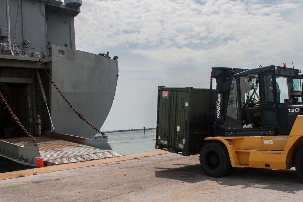 2nd Marine Aircraft Wing Marines load cargo on to USNS Wright