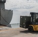 2nd Marine Aircraft Wing Marines load cargo on to USNS Wright