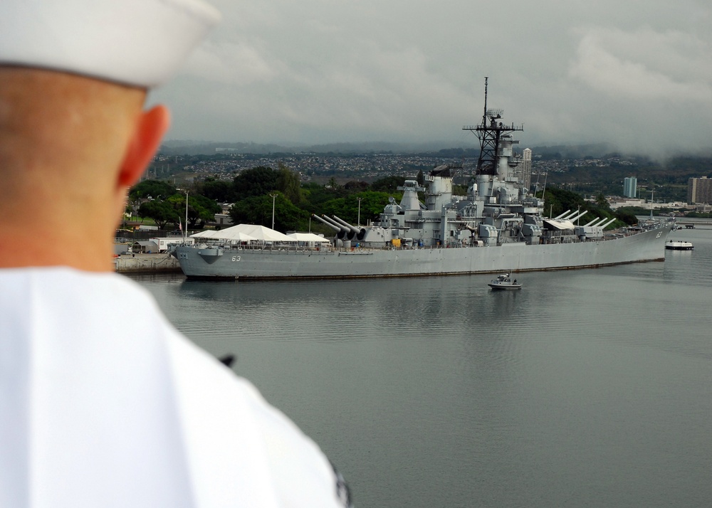 USS Peleliu passes the USS Missouri Memorial