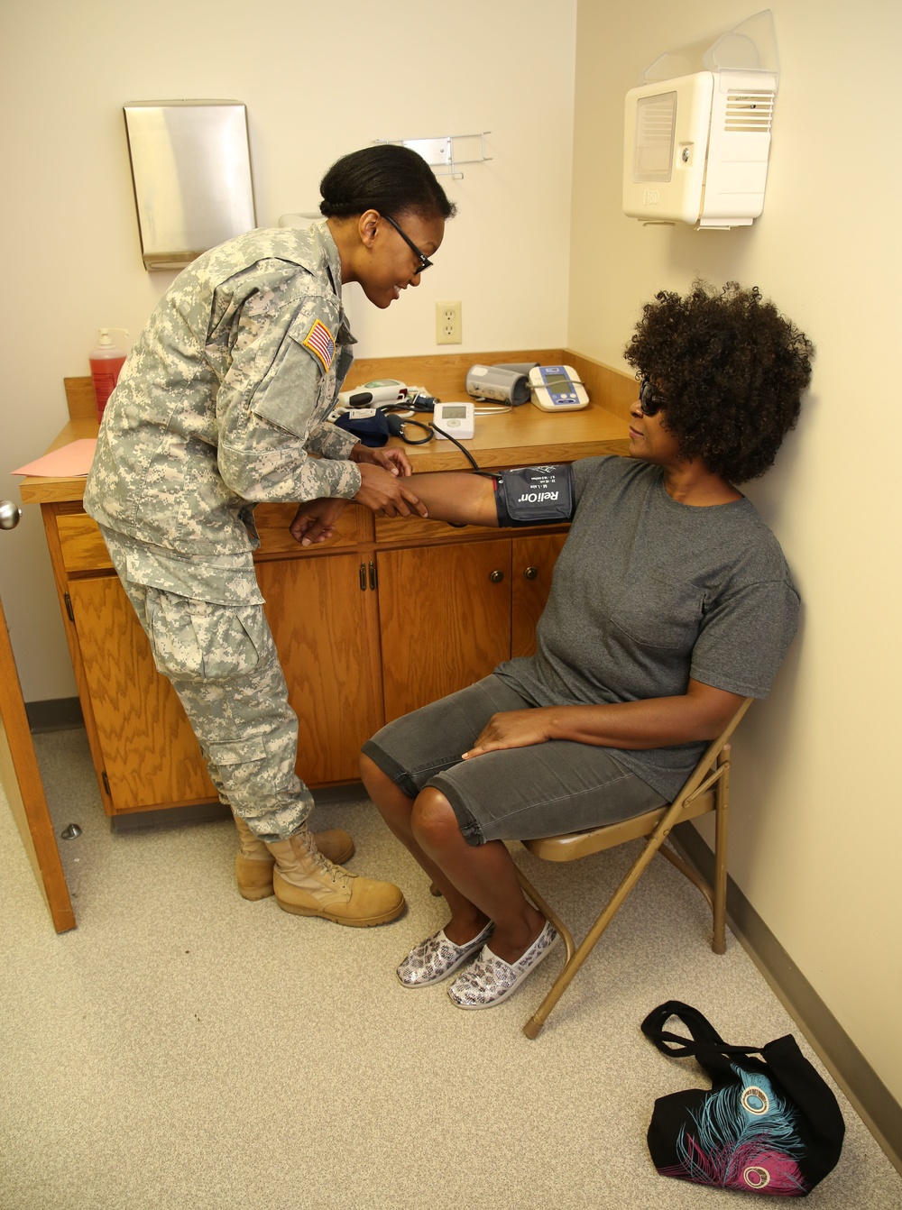 Service Members Working Together Providing Healthcare to People in Need