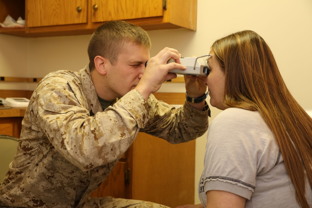 Service Members Working Together Providing Healthcare to People in Need