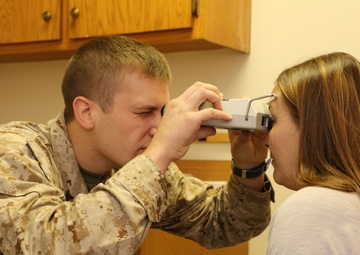 Service Members Working Together Providing Healthcare to People in Need