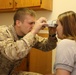 Service Members Working Together Providing Healthcare to People in Need