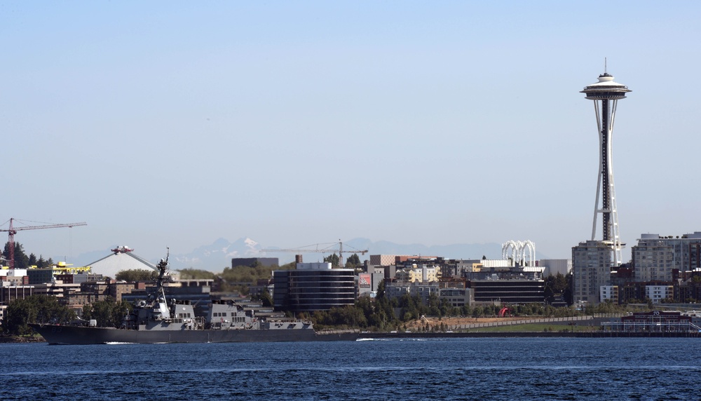 The Arleigh Burke-class destroyer USS Howard (DDG 83) transits Elliott Bay in departure from Seattle Seafair Fleet Week 2014