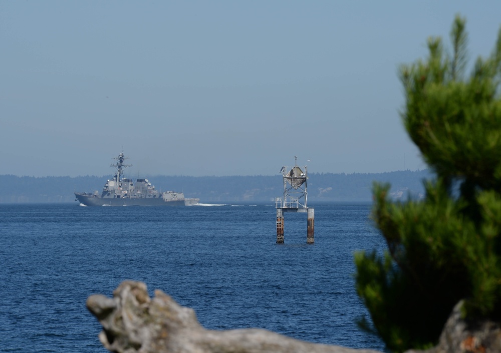 The Arleigh Burke-class destroyer USS Howard (DDG 83) transits Elliott Bay in departure from Seattle Seafair Fleet Week 2014