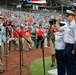 Vice Adm. Neffenger re-enlists three Coast Guardsmen at a Washington Nationals game