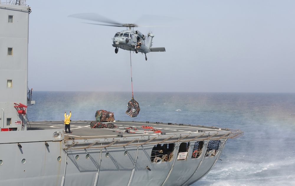Sea Hawks transport supplies during replenishment at sea