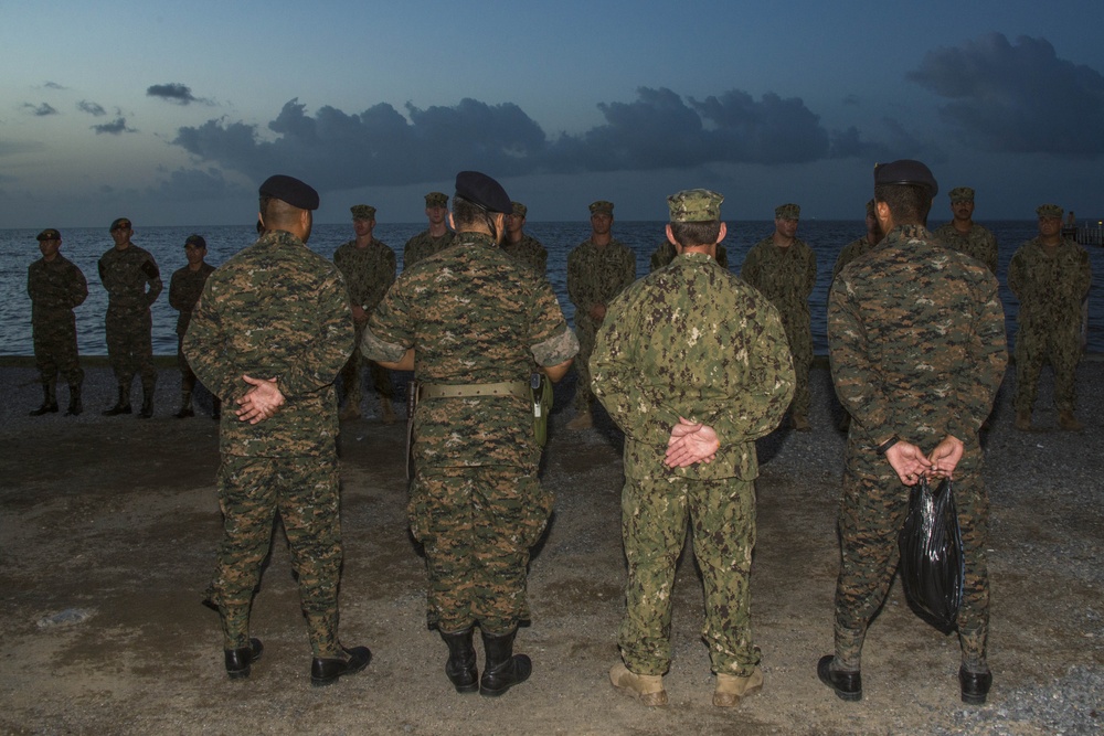 US Navy divers participate in a closing ceremony with Guatemalan divers as part of Southern Partnership Station '14