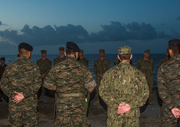 US Navy divers participate in a closing ceremony with Guatemalan divers as part of Southern Partnership Station '14