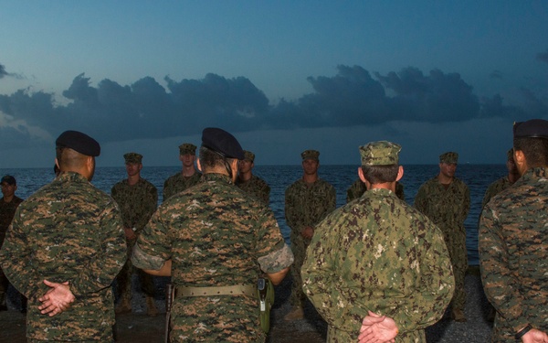 US Navy divers participate in a closing ceremony with Guatemalan divers as part of Southern Partnership Station '14
