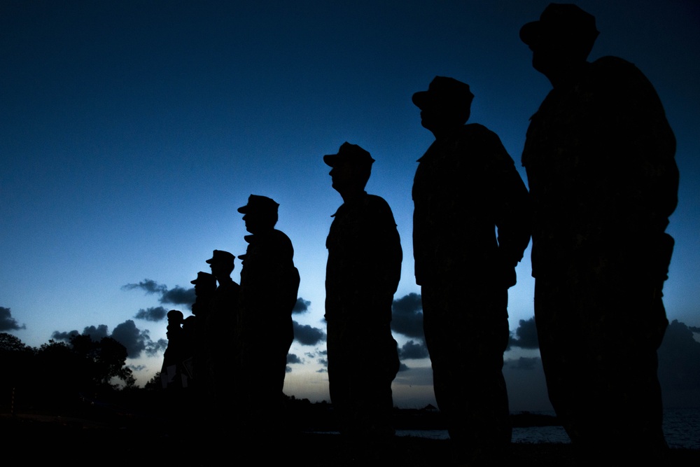 US Navy divers participate in a closing ceremony with Guatemalan divers as part of Southern Partnership Station '14