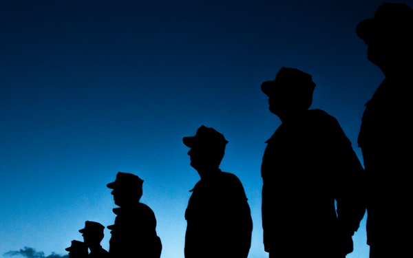 US Navy divers participate in a closing ceremony with Guatemalan divers as part of Southern Partnership Station '14