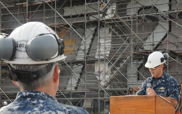 Newport News Shipbuilding installs final mast section on USS Abraham Lincoln