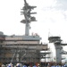 Newport News Shipbuilding installs final mast section on USS Abraham Lincoln