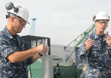 Newport News Shipbuilding installs final mast section on USS Abraham Lincoln