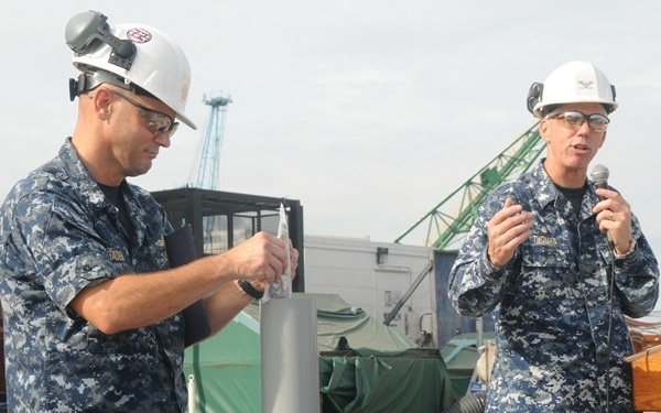 Newport News Shipbuilding installs final mast section on USS Abraham Lincoln