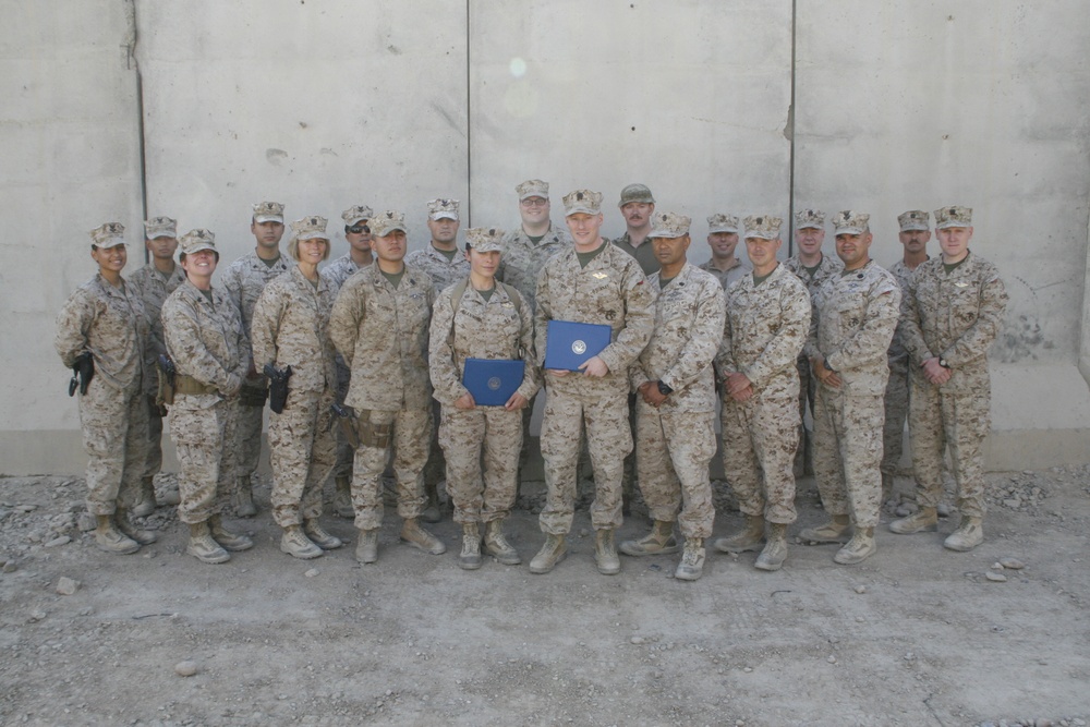 Navy officers earn Fleet Marine Force Warfare Officer device while serving in Afghanistan