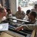 Command Sgt. Maj. Brunk W. Conley visits with Georgia National Guard Soldiers