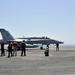 F/A-18C Hornets prepare for takeoff during operations aboard USS George H.W. Bush in the Arabian Gulf