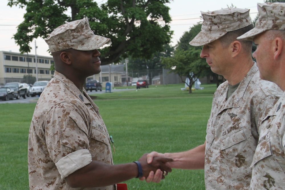 Marine awarded for his outstanding work for 4MCD