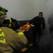 USS Nimitz Sailors practice firefighting techniques