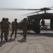 Australian special operations forces board a US Army UH-60 Black Hawk