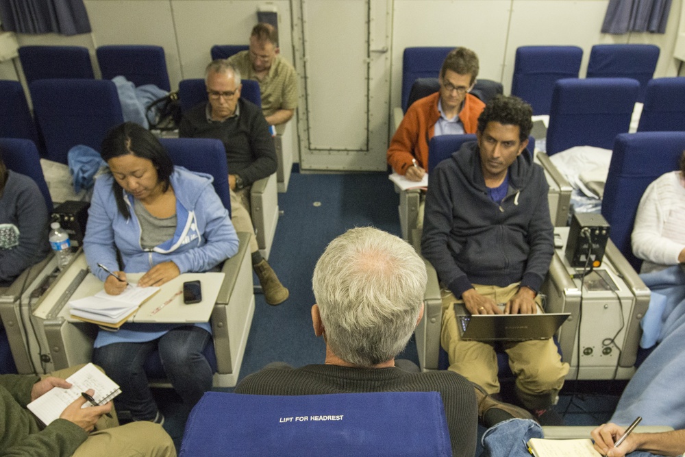 Hagel briefs reporters during flight to New Delhi