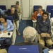 Hagel briefs reporters during flight to New Delhi