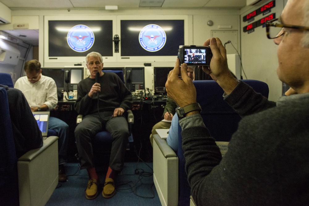 Hagel briefs reporters during flight to New Delhi