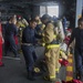 Midshipmen practice damage control aboard USS Peleliu