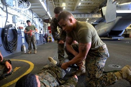 Corpsman teach CLS aboard USS America
