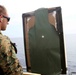 Marines conduct first time combat marksmanship practice aboard USS America