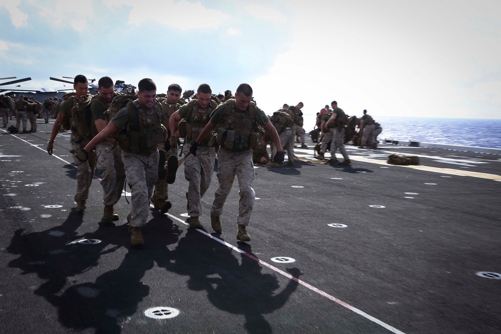 Golf Co. BLT 2/1 conducts PT on the flight deck of the USS Makin Island