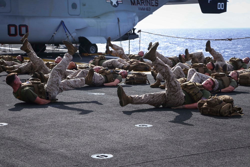 Golf Co. BLT 2/1 conducts PT on the flight deck of the USS Makin Island