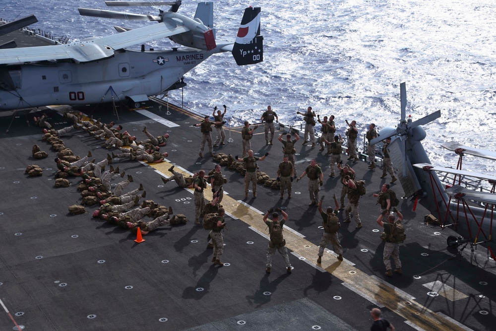 Golf Co. BLT 2/1 conducts PT on the flight deck of the USS Makin Island