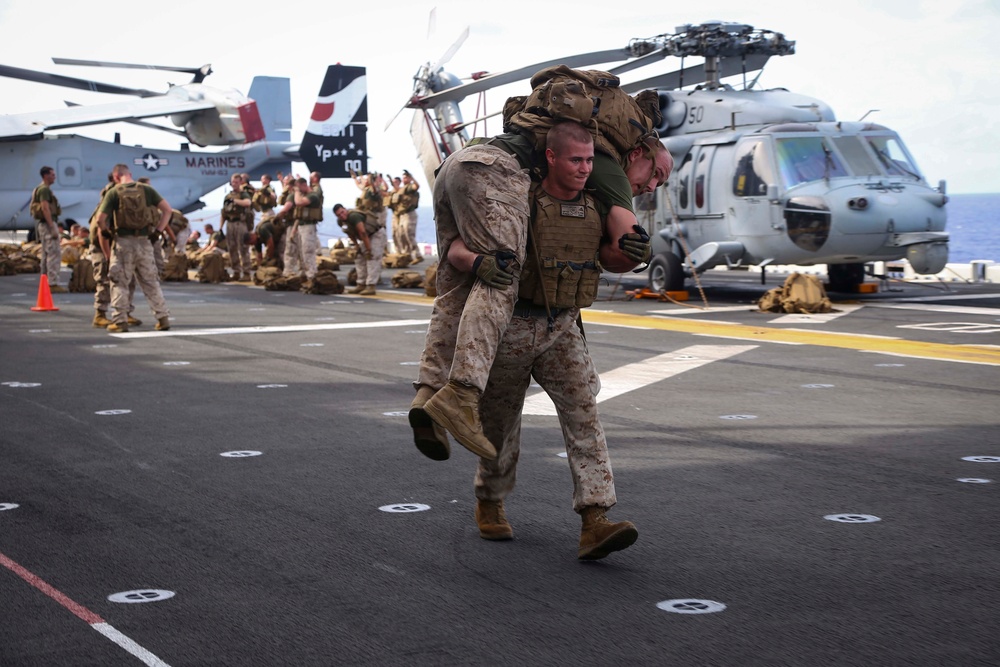 Golf Co. BLT 2/1 conducts PT on the flight deck of the USS Makin Island