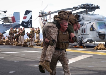 Golf Co. BLT 2/1 conducts PT on the flight deck of the USS Makin Island