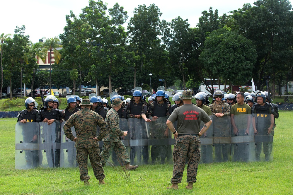 AFP and PNP practice riot control formations