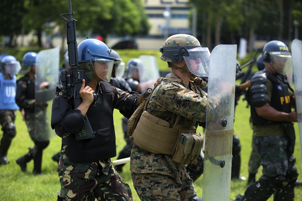 AFP and PNP practice riot control formations