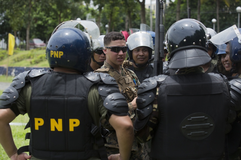 AFP and PNP practice riot control formations