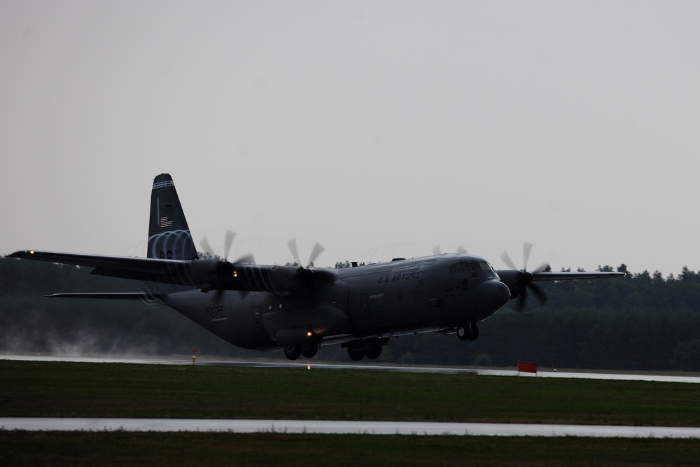 Cloudburst: C-130s train through adverse weather
